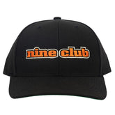 The Dupe Black Hat, black snapback with orange nine club embroidery outlined in cream, front view